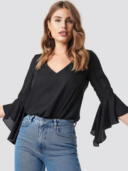 Black chiffon V-neck blouse with flared sleeves