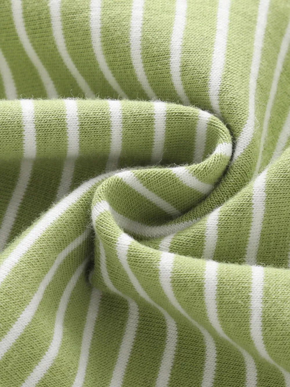 Green and white striped cotton toddler set fabric detail