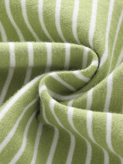 Green and white striped cotton toddler set fabric detail