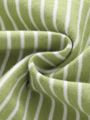 Green and white striped cotton toddler set fabric detail