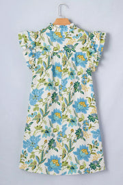 Cotton floral mini dress with ruffled sleeves and a high neckline.
