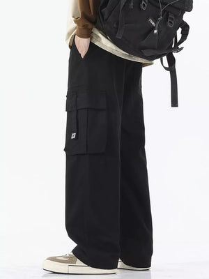 Black wide-leg cargo sweatpants with multiple pockets and a logo detail.