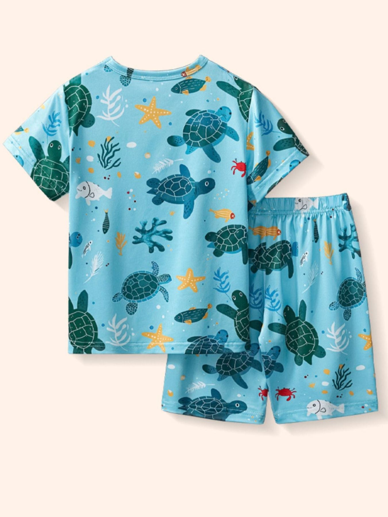 Toddler tee and shorts set with sea creature print, featuring turtles, fish, and starfish on a light blue background.