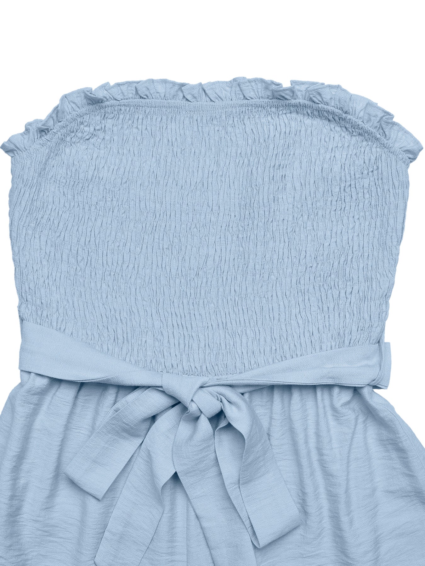Belted smocked romper in light blue with ruffled neckline and tie waist.
