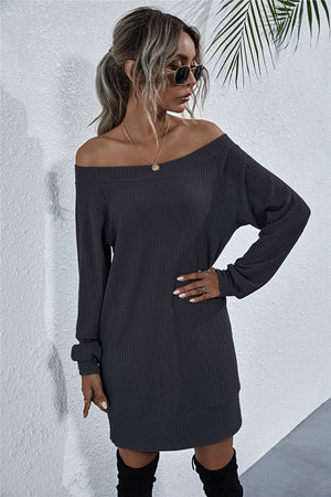 Off-shoulder waffle knit mini dress in dark gray with long sleeves and a boat neck.