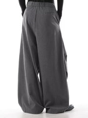 Men's grey casual wide leg sweatpants with drawstring waist and pockets.