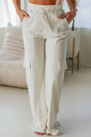 Ivory wide leg cargo pants with drawstring waist and cargo pockets