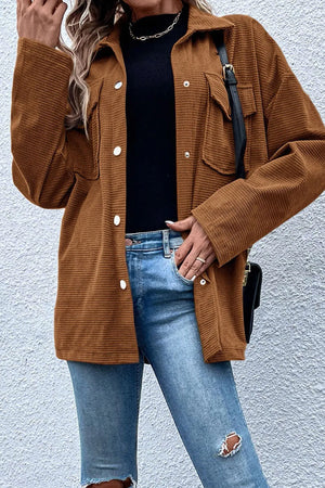 Brown waffle knit overshirt with patch pockets and button-down front.