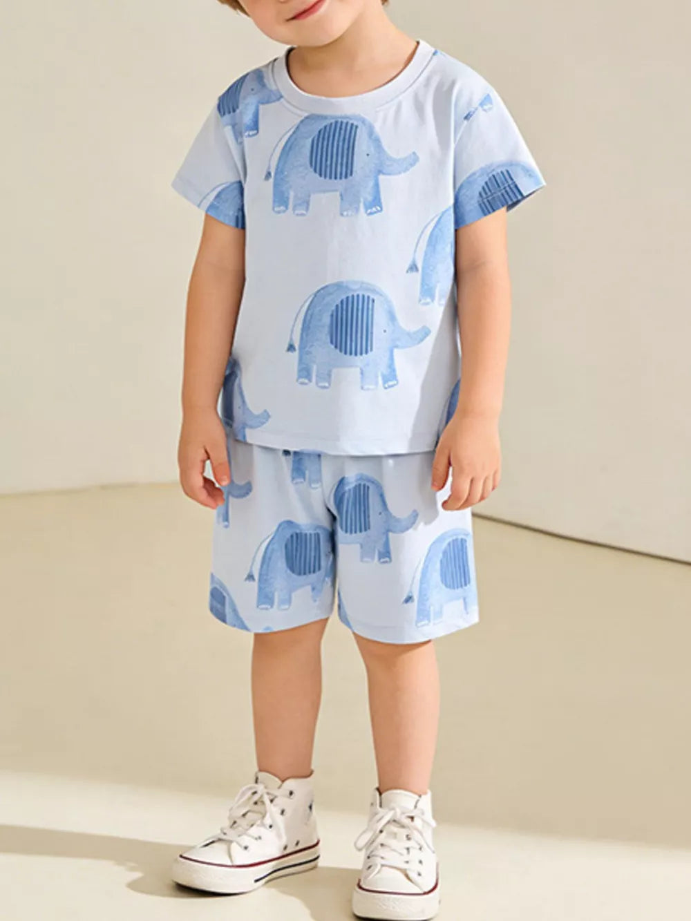 Boys' light blue cotton t-shirt and shorts set with playful elephant print.