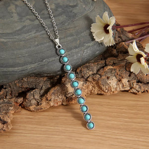 Timeless turquoise beaded pendant necklace with alloy chain, delicate boho style.