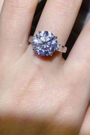 Silver ring with large radiant moissanite solitaire and pavé shoulders