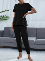 Black relaxed-fit tee and jogger lounge set with crew neck and short sleeves.