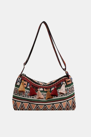 Geometric embroidered shoulder bag with colorful tassels and tribal pattern
