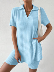 Light blue ribbed polo shirt and shorts set with a V-neck and collar.