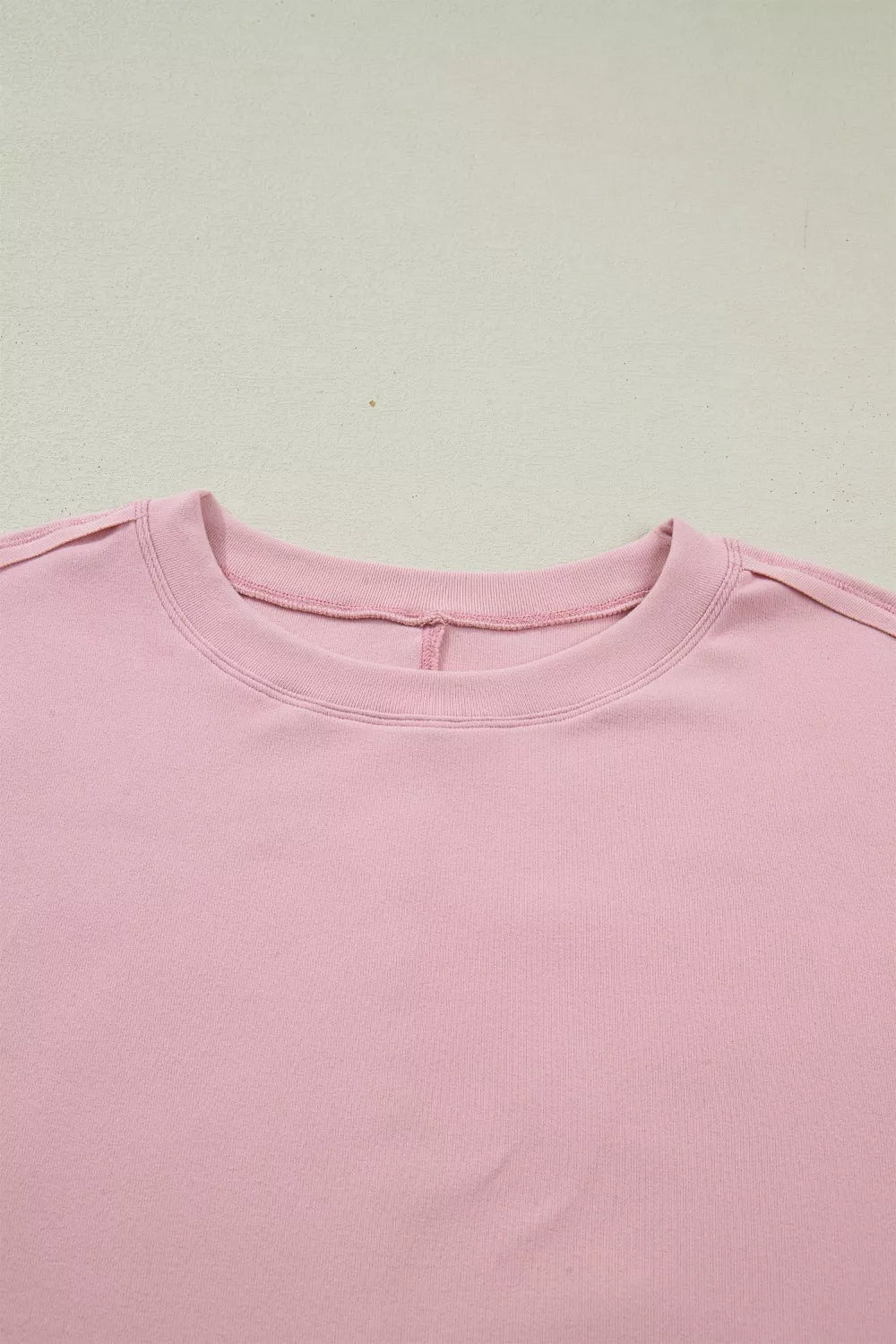 Pink maternity t-shirt with crew neck and lace sleeves detail