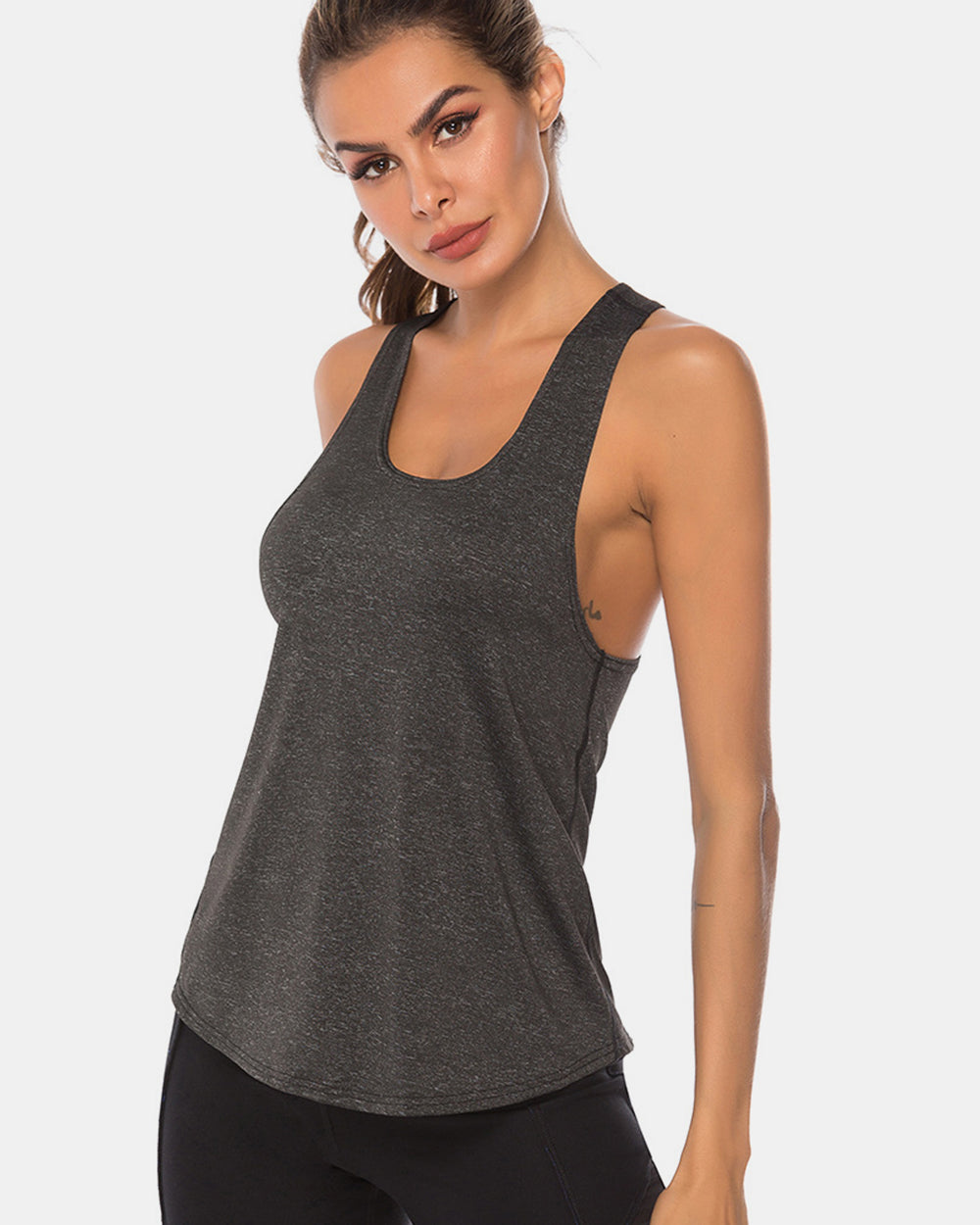 Racerback performance tank top in dark grey heather with a scoop neck.