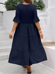 Navy blue midi dress with ruffle sleeves and tiered skirt