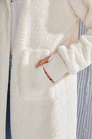 Cream plush hooded duster with thumbhole cuffs and pockets