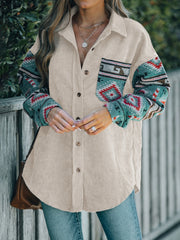 Corduroy shacket in dust storm with Aztec print sleeves and pocket detail.