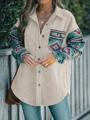 Corduroy shacket in dust storm with Aztec print sleeves and pocket detail.