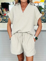 Chic beige striped cotton polo top and drawstring shorts set.