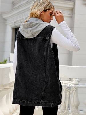 Dark denim hooded vest with contrast grey hood and white long sleeve shirt.