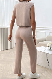 Taupe ribbed knit cropped lounge set with sleeveless top and wide leg pants.