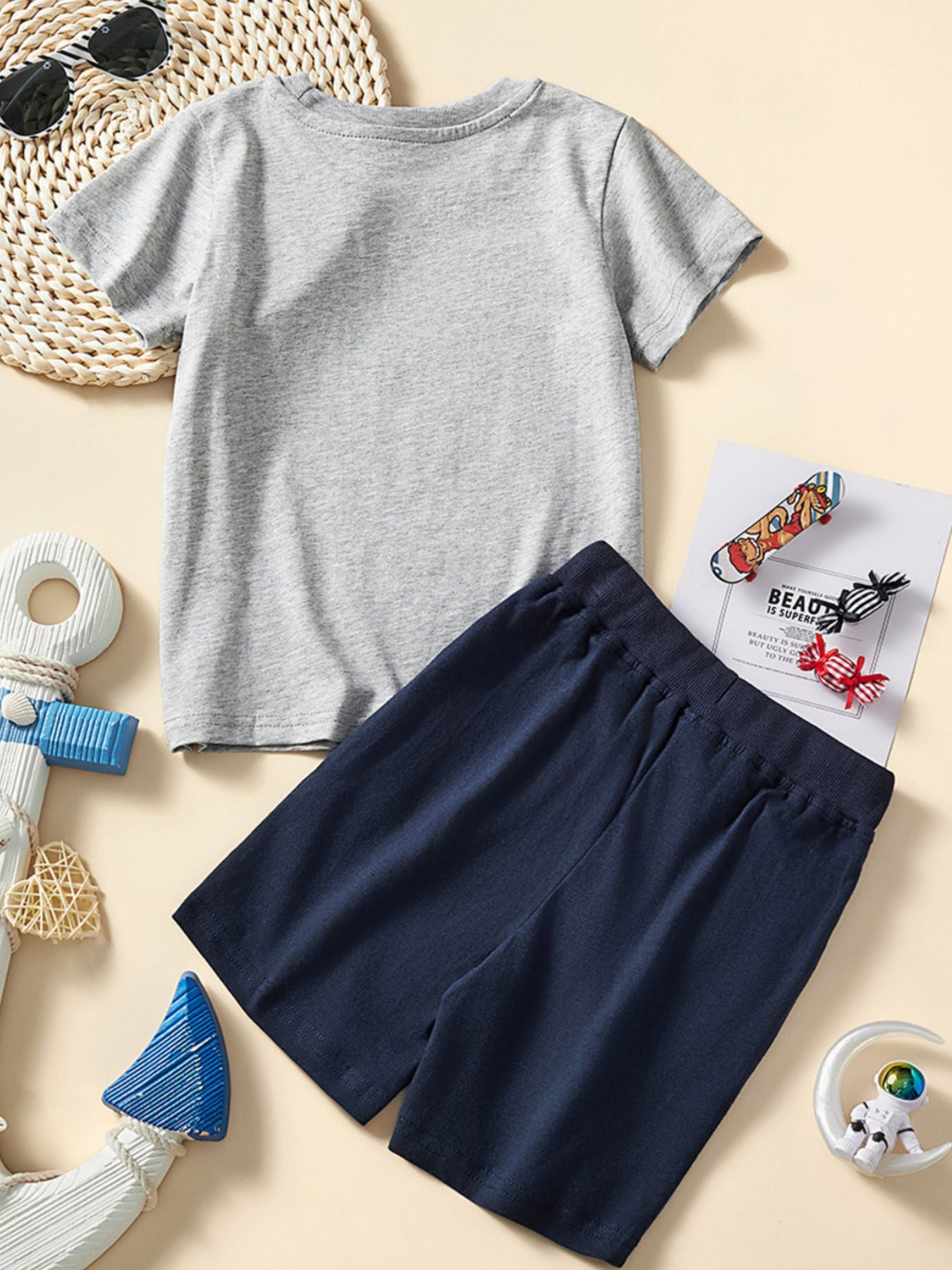 Toddler grey cotton tee and navy elastic waist shorts set.