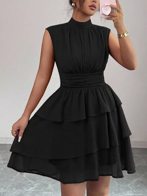Black sleeveless ruffle tiered dress with ruched waist detail