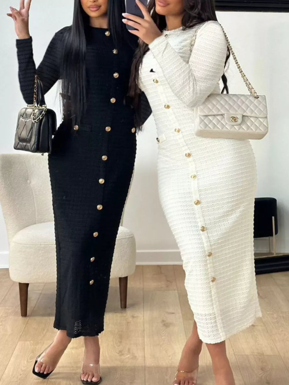 Chic textured midi dress with decorative buttons in black and white, crew neck, long sleeves.