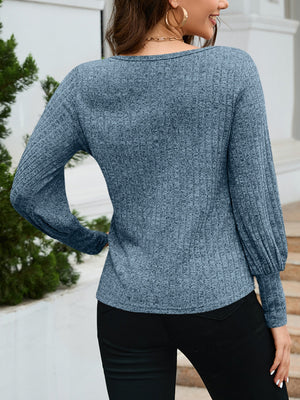 Misty Blue knit sweater with scoop neck and balloon sleeves, ribbed texture.