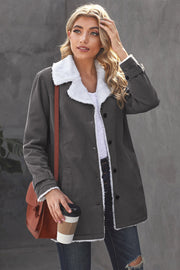 Sherpa-lined dark gray canvas button-down jacket with white sherpa trim.
