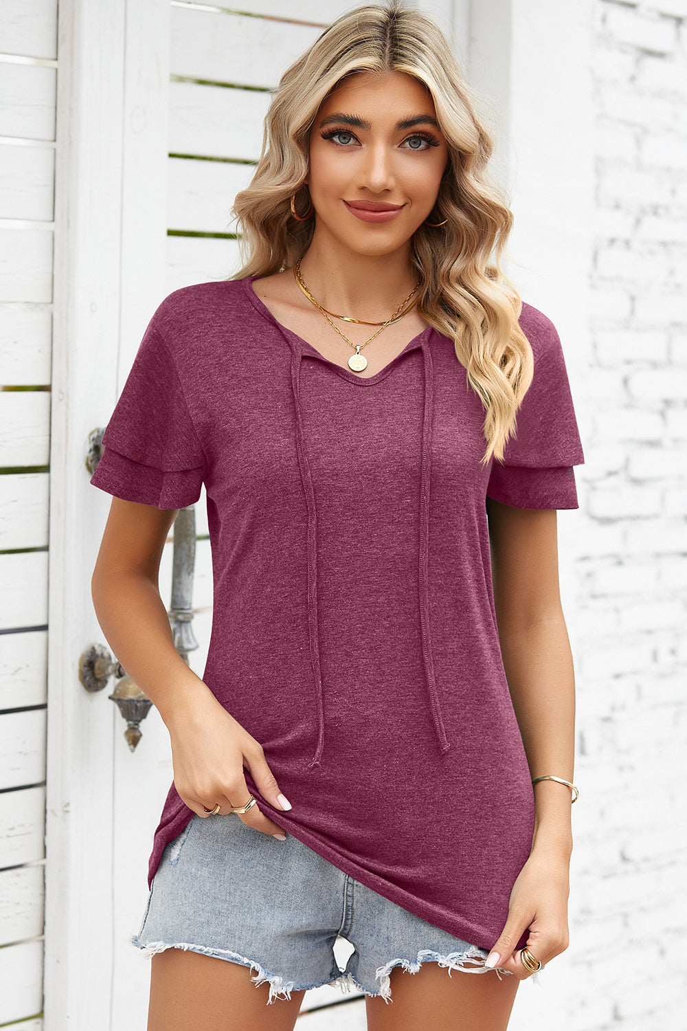 Burgundy flutter sleeve henley tee with tie-neck detail
