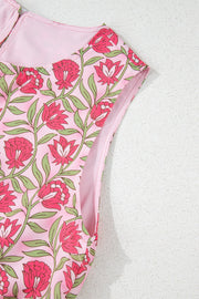 Floral print crop top in dusty pink with a pink lining and cap sleeves.