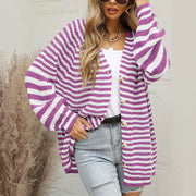 Heliotrope purple and white stripe button-up knit cardigan with balloon sleeves.