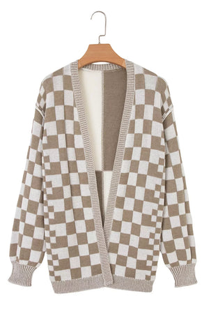 Checkerboard knit cardigan with ribbed details and a V-neck, in brown and white acrylic.