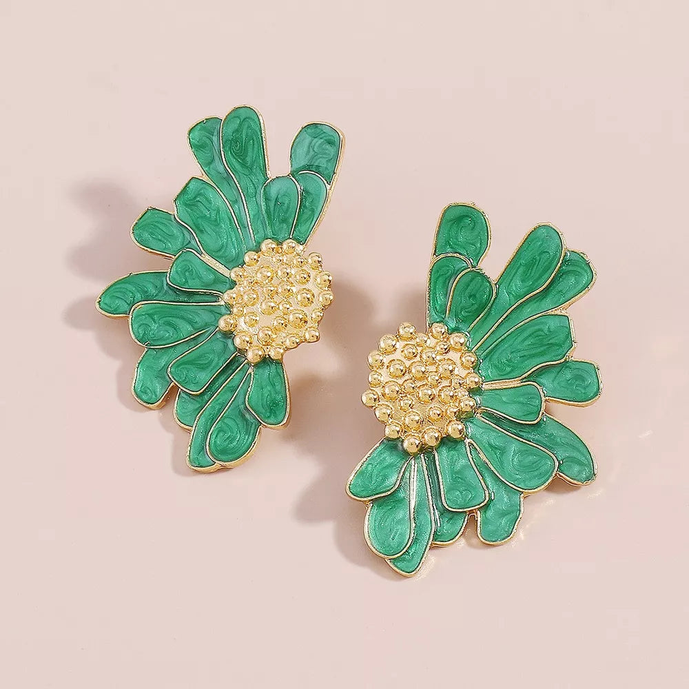 Textured green flower stud earrings with gold center detail.