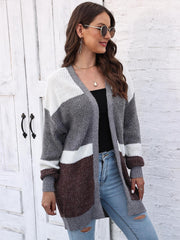 Colorblock knit open cardigan in dark gray, white, and brown with a relaxed fit.
