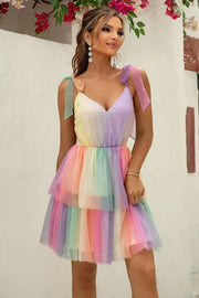 Rainbow tulle mini dress with tie straps and tiered skirt