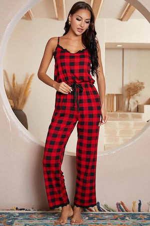 Red plaid cami jumpsuit with black lace trim and drawstring waist.