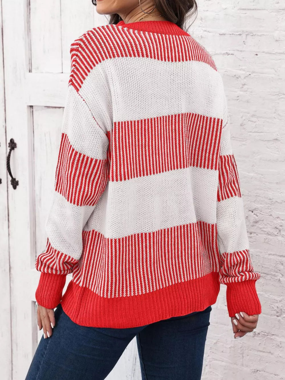 Cozy color block knit sweater in orange-red and white stripes, acrylic, crew neck, long sleeves.