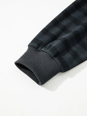Dark gray striped pajama sleeve cuff detail