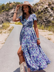 Floral V-neck midi dress with button front and high slit, short sleeves, blue and purple pattern