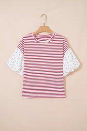 Maternity red and white striped shirt with patchwork floral puff sleeves.