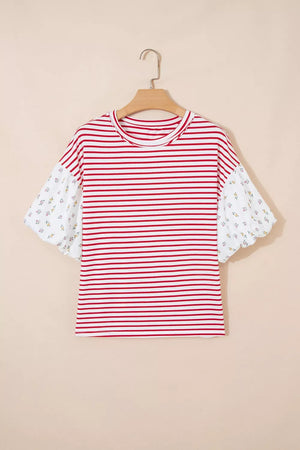 Maternity red and white striped shirt with patchwork floral puff sleeves.