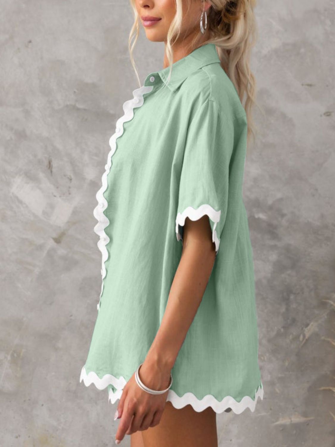 Gum Leaf linen shirt set with scalloped white trim and short sleeves.