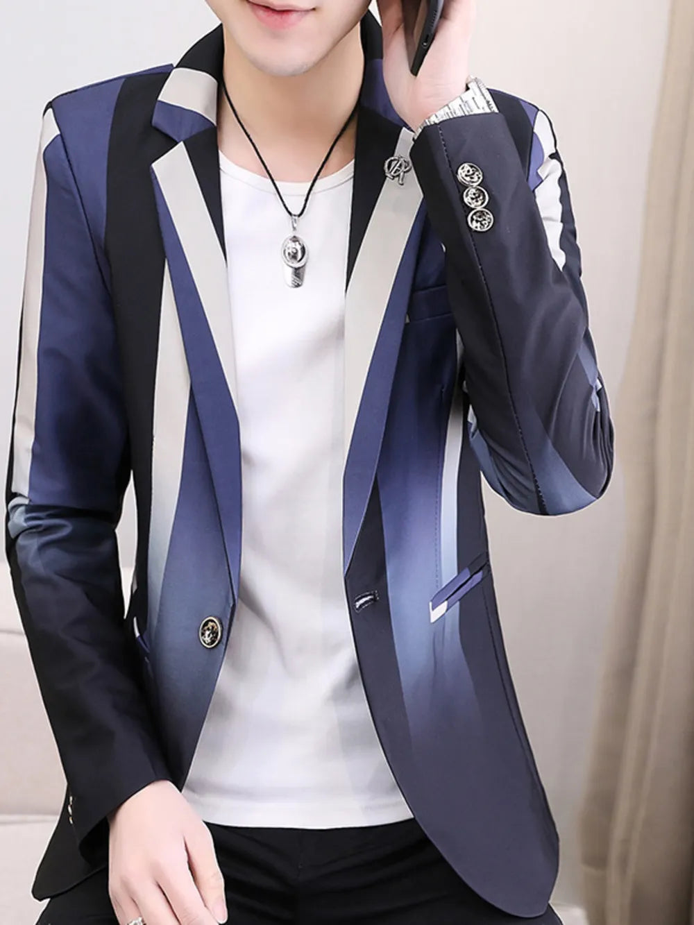 Men's blue gradient striped slim fit blazer with button closure and lapel collar.