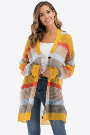 Striped open-knit longline cardigan in gold with colorful horizontal stripes and a relaxed fit.