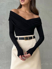 Black off-shoulder bodysuit with ruching detail and long sleeves