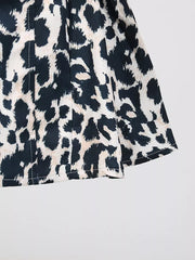 Leopard print mini dress with halter neck detail